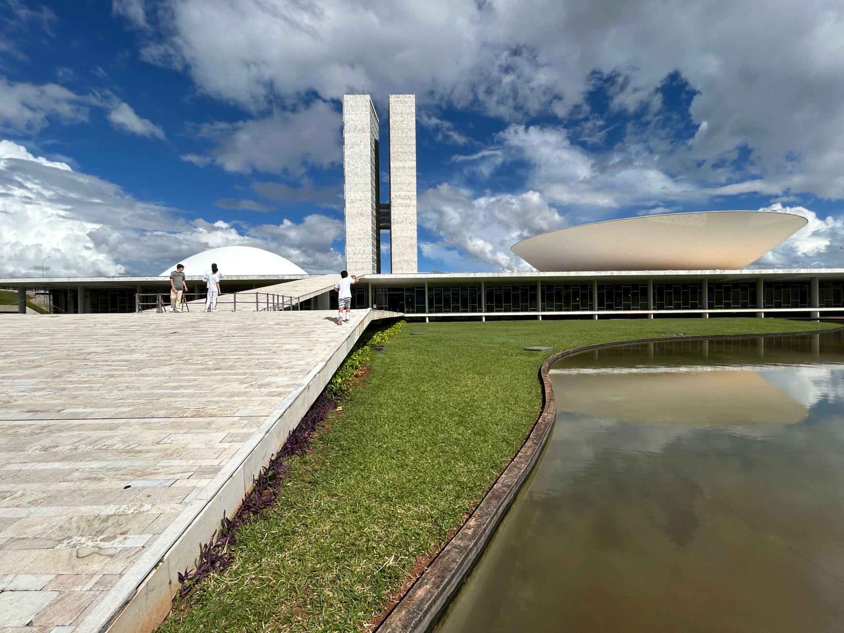 Stunning view of the National Congress of Brazil with its iconic modern architecture under a bright sky.